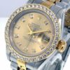 Réplica de lujo Rolex Lady-datejust 26 mm oro amarillo y bisel de acero champagne engastado con 69173 diamantes